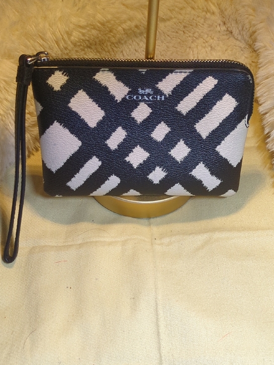 Coach Handbags - Coach Black and White Wristlet Pouch NOW ONLY $50